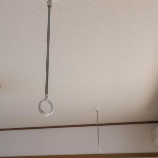 室内物干機 物干竿を通すと室内干しが可能